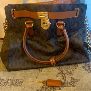Michael Kors Lock and Key logo purse